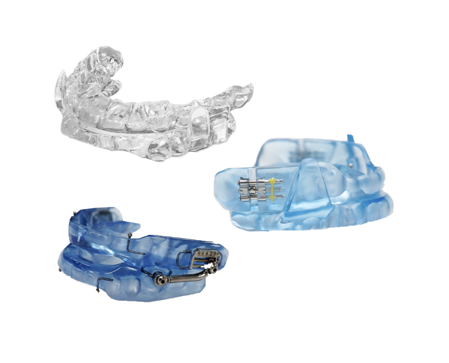 Three oral appliances for sleep apnea in various colors
